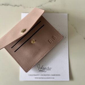 Pink embossed coin purse with card holder